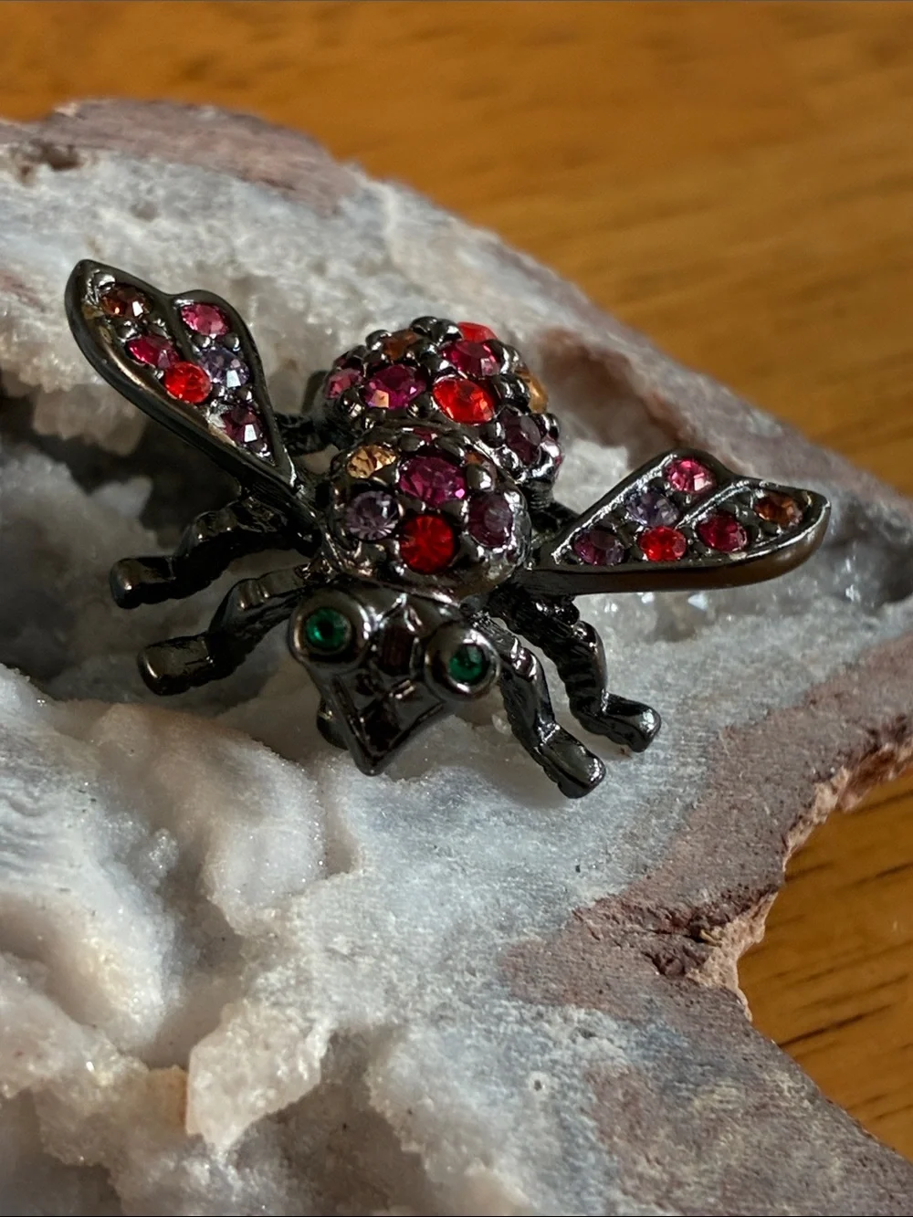 Joan Rivers red and pink rhinestone bee brooch in Japaned metal tone